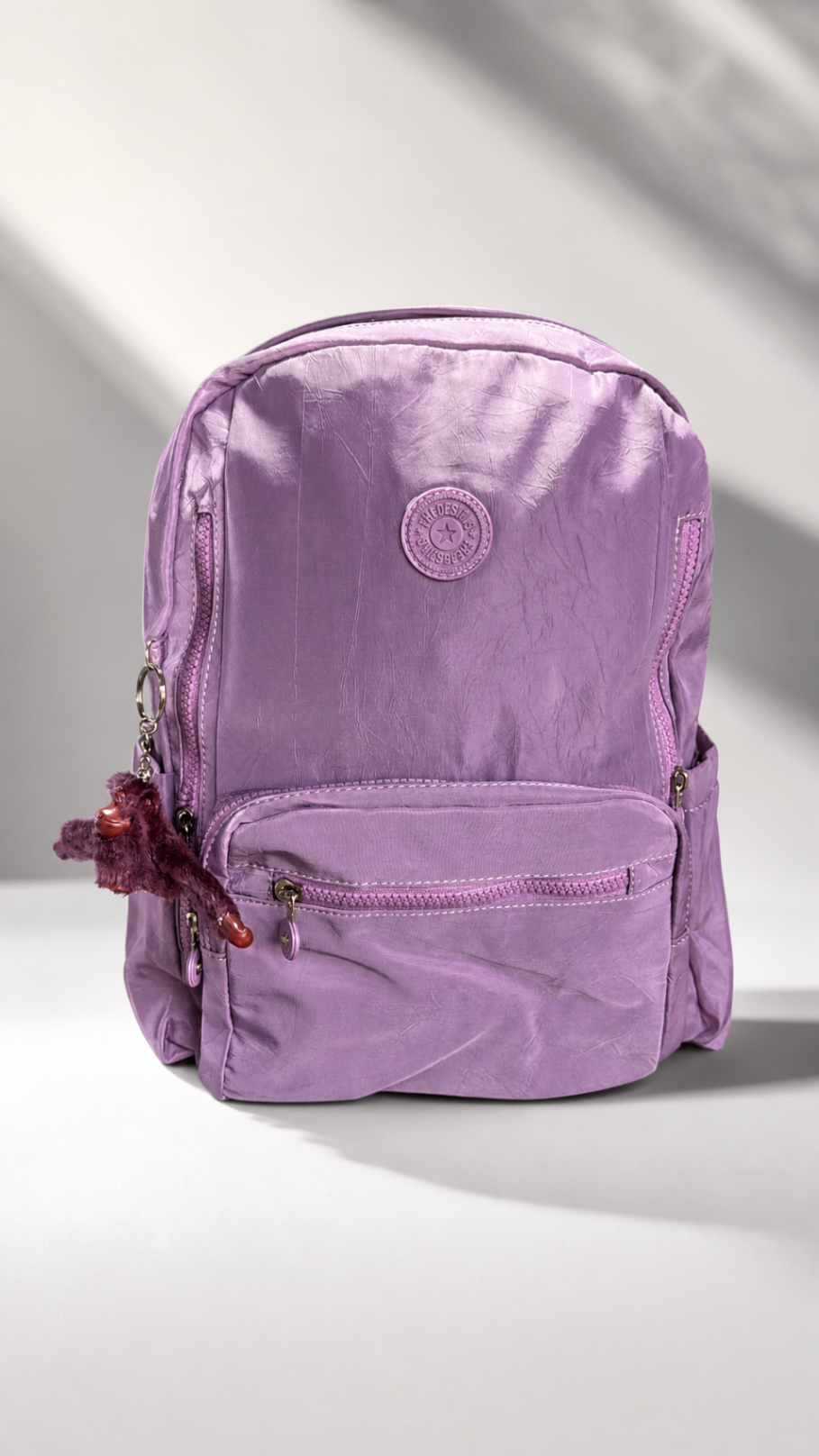 Morral casual lila puesto $60.000